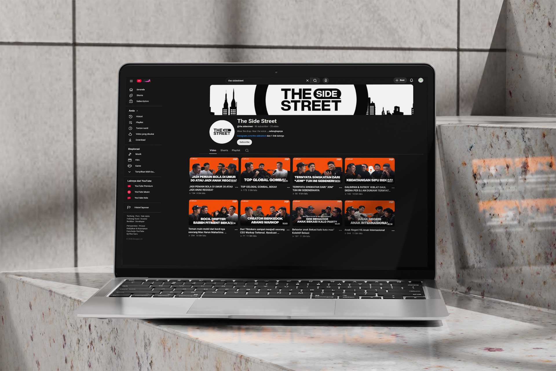 Portofolio video production menampilkan tampilan kanal YouTube podcast The Side Street di layar laptop.